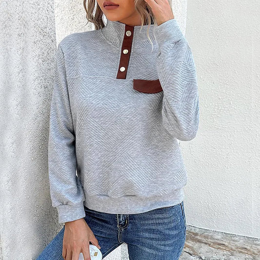 Gestepptes Pullover mit Knopfkragen