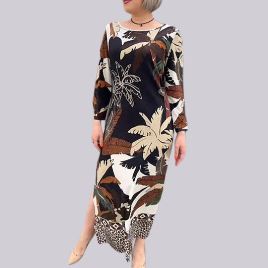 Kleid mit auffälligem Tropenprint und kontrastierendem Saum